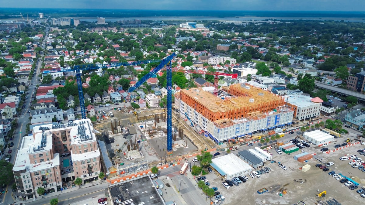 Residential development under construction with cranes